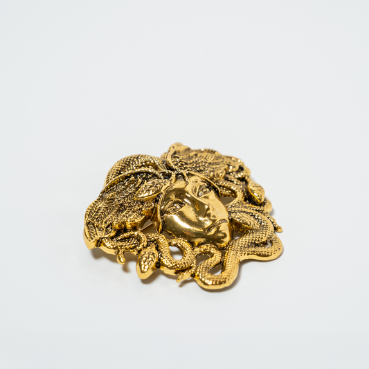 Prendedor Misterio Dorado
